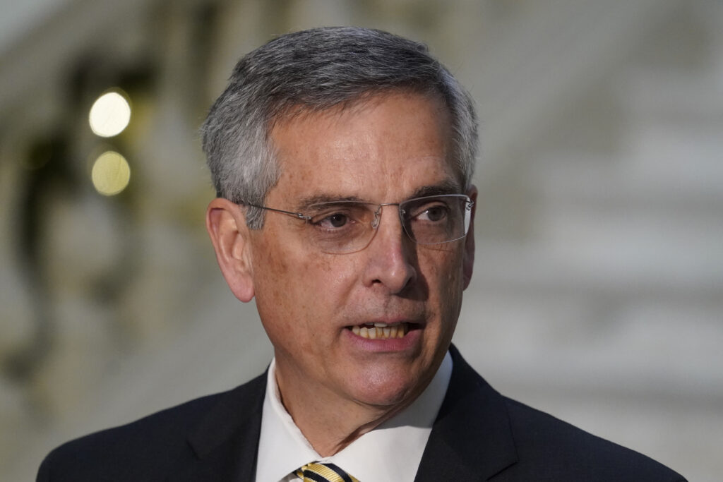 In this Dec. 14, 2020, photo, Georgia Secretary of State Brad Raffensperger speaks during a news conference in Atlanta. A Georgia prosecutor is expected to seek a grand jury indictment in the coming weeks in her investigation into efforts by Donald Trump and his allies to overturn the former presidentâs 2020 election loss. Fulton County District Attorney Fani Willis began investigating more than two years ago, shortly after a recording was released of a January 2021 phone call Trump made to Georgiaâs secretary of state.