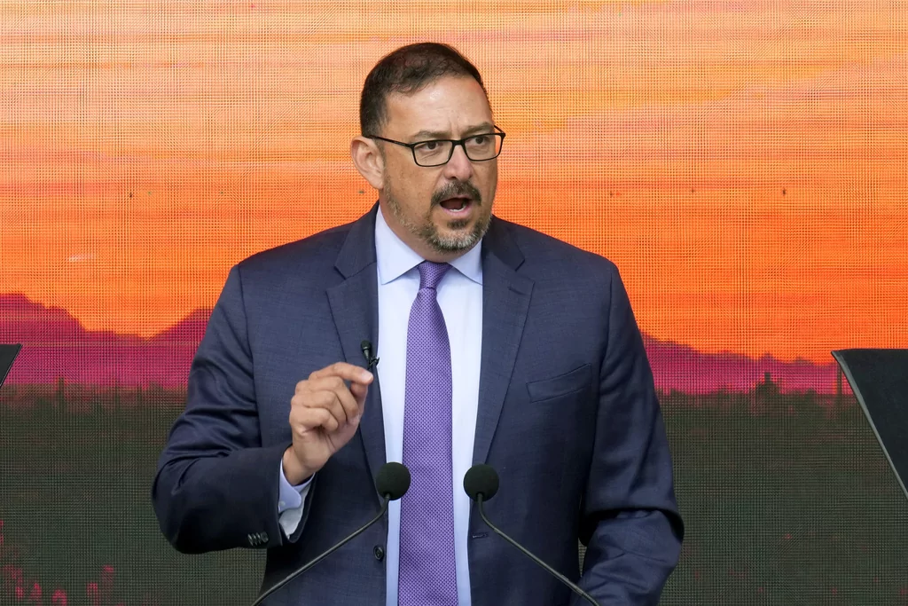 FILE - Arizona Secretary of State Adrian Fontes speaks after taking the oath of office at the Arizona Capitol in Phoenix on Jan. 5, 2023. On Friday, Feb. 9, 2024, a conservative group filed a lawsuit against Fontes challenging parts of Arizona’s election procedures manual, which was released in late 2023 by Fontes' office. It's the third lawsuit that seeks to throw out provisions in the state’s guide for conducting elections. (AP Photo/Ross D. Franklin, File)