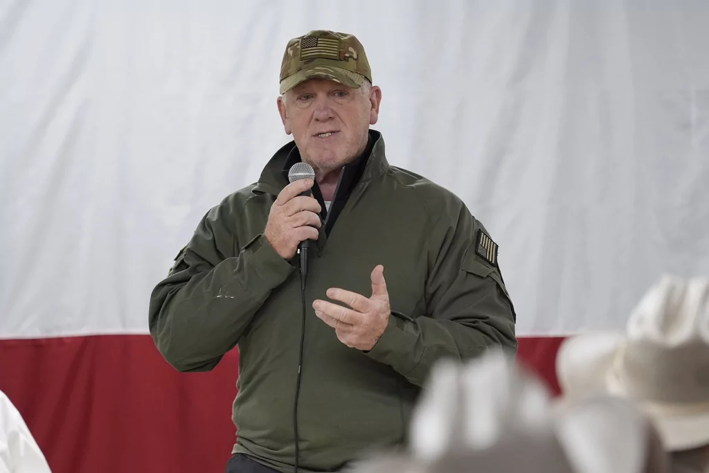 Incoming U.S. Border Czar Tom Homan talks to state troopers and national guardsmen who are taking part in Operation Lone Star at a facility on the U.S.-Mexico border, Tuesday, Nov. 26, 2024, in Eagle Pass, Texas. (AP Photo/Eric Gay)