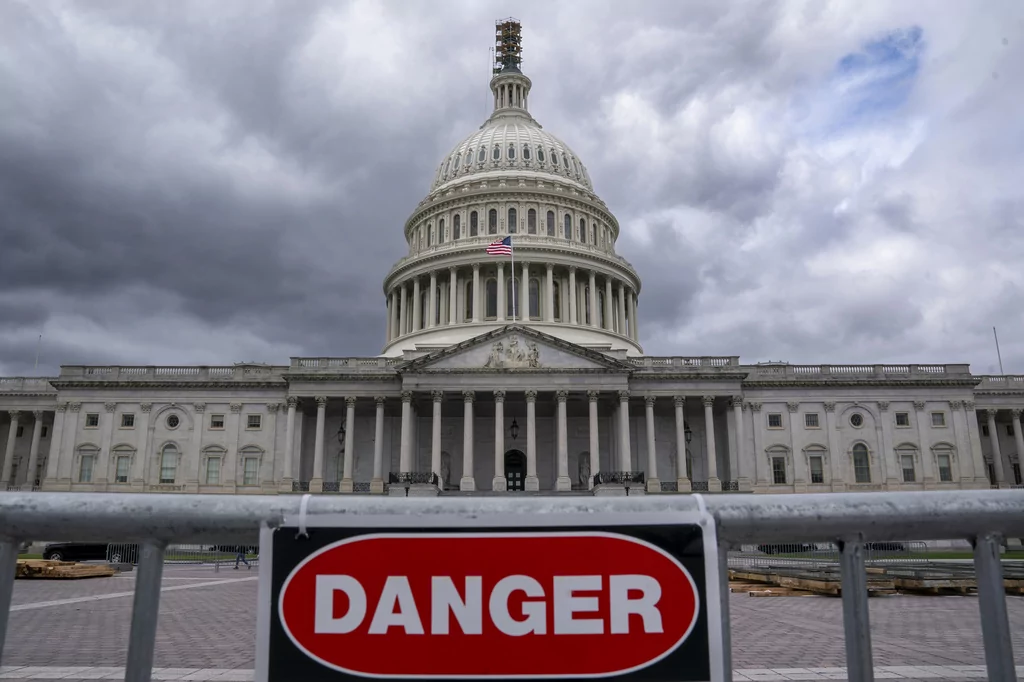 A security fence warns visitors away from a construction area at the Capitol in Washington, Monday, Sept. 25, 2023.