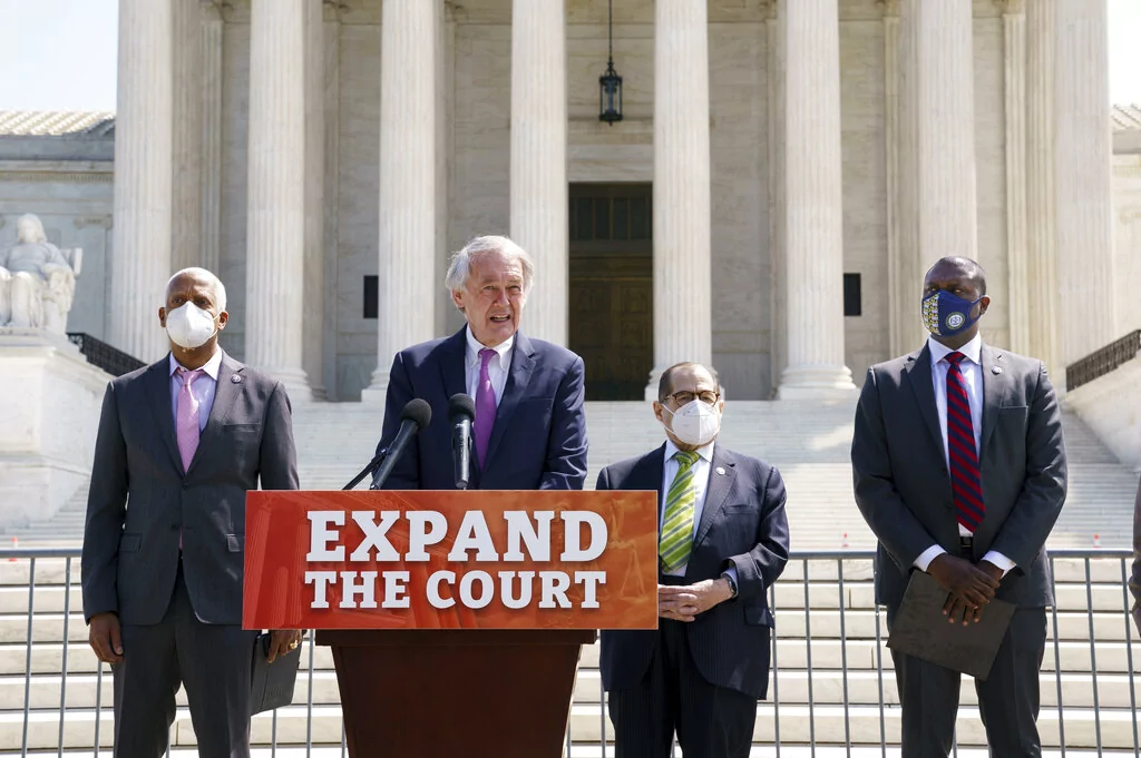 From left, Rep. Hank Johnson (D-GA), Sen. Ed Markey (D-MA), House Judiciary Committee Chairman Jerrold Nadler (D-NY), and Rep. Mondaire Jones (D-NY) hold a press conference outside the Supreme Court to introduce legislation aimed at expanding the number of seats on the high court.