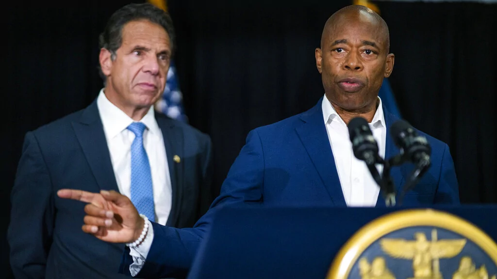 Brooklyn Borough President and New York City mayoral candidate Eric Adams, right, speaks to the media accompanied by Gov. Andrew Cuomo during a news conference at Lenox Road Baptist Church in the Brooklyn borough of New York on Wednesday, July 14, 2021. (AP Photo/Eduardo Munoz Alvarez)