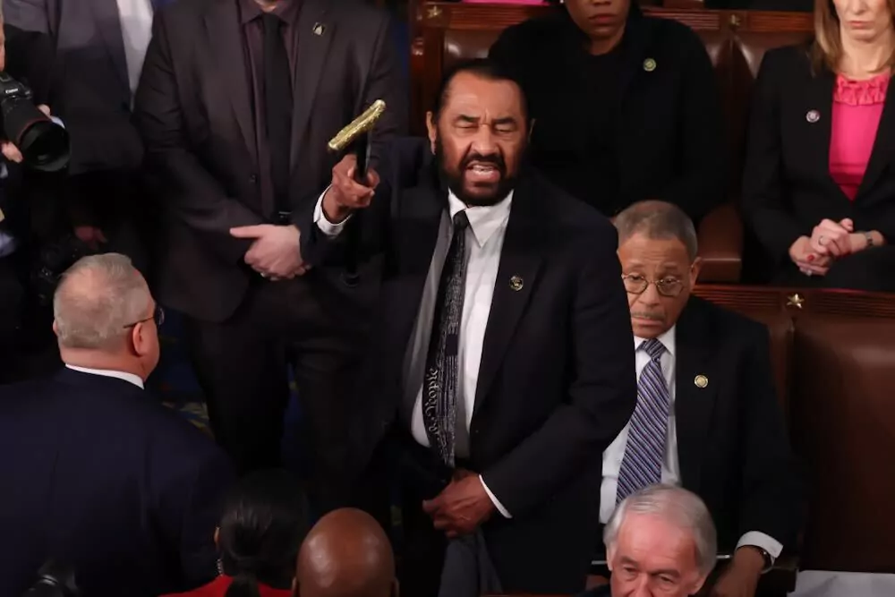 Al Green is removed from the Capitol after protesting President Donald Trump's address (Graeme Jennings)