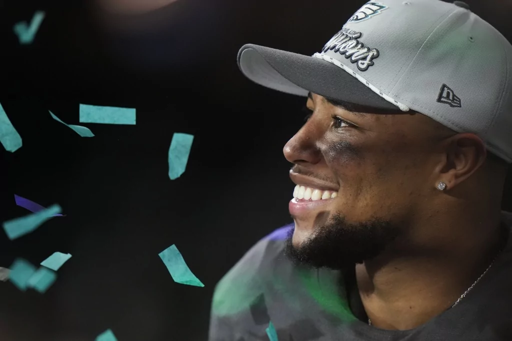 Philadelphia Eagles running back Saquon Barkley smiles after the NFL Super Bowl 59 football game against the Kansas City Chiefs, Sunday, Feb. 9, 2025, in New Orleans.