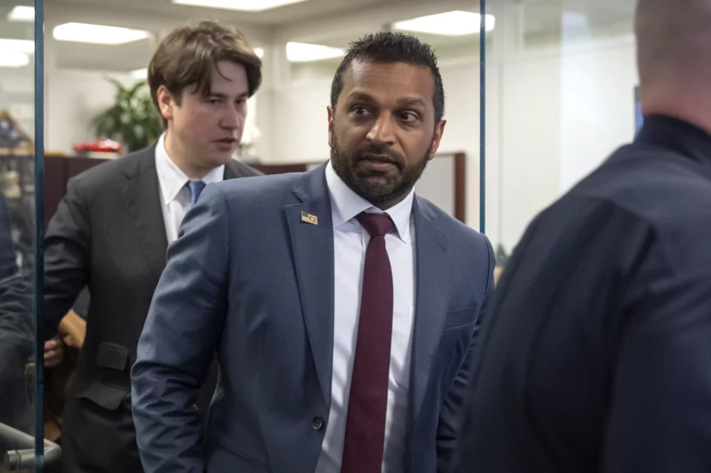 Kash Patel, President-elect Donald Trump's pick to be the director of the FBI, leaves after a meeting in the office of Sen. John Cornyn, R-Texas, on Capitol Hill, Monday, Dec. 9, 2024, in Washington. 