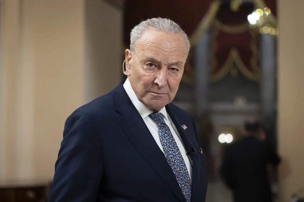 Senate Democratic Leader Chuck Schumer gives a television interview at the Capitol in Washington, Friday, March 14, 2025.