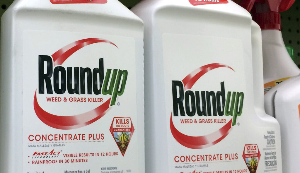 FILE - In this Jan. 26, 2017, file photo, containers of Roundup, a weed killer made by Monsanto, is seen on a shelf at a hardware store in Los Angeles. Republican lawmakers are threatening to cut off U.S. funding for the World Health Organizationâs cancer research program over its finding that the glyphosate herbicide Roundup is probably carcinogenic to humans.