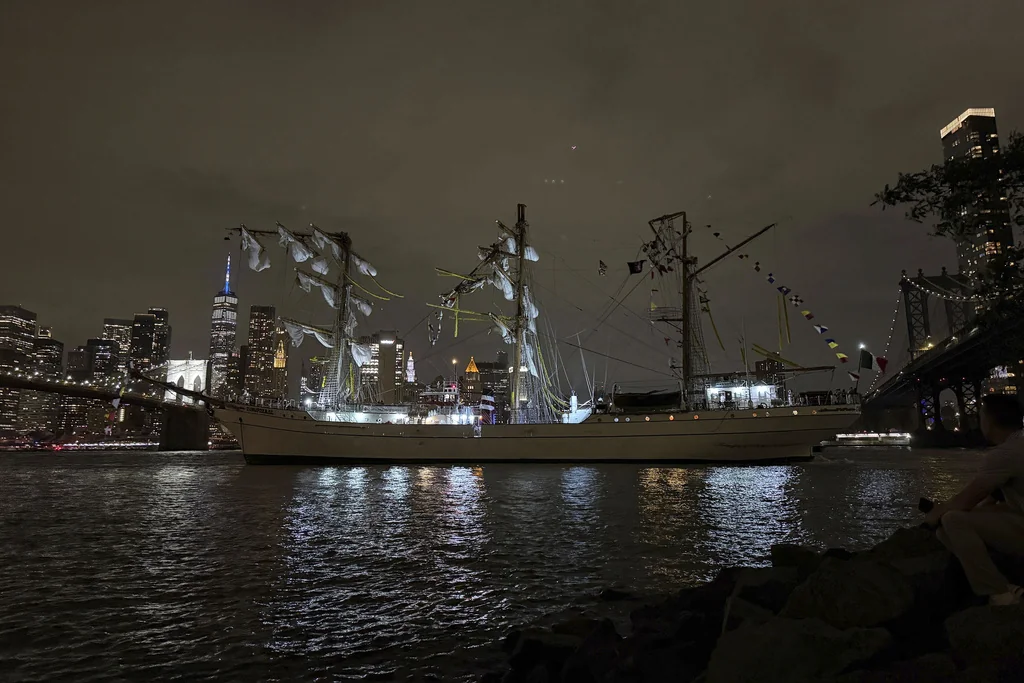 A masted Mexican Navy training ship, the Cuauhtémoc, sits stranded after colliding with the Brooklyn Bridge after, Saturday, May 17, 2025, in New York.