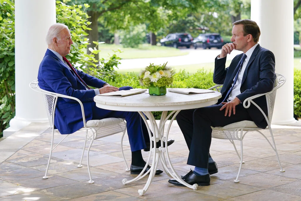 President Joe Biden meets with Sen. Chris Murphy, D-Conn., about gun control at the White House, Tuesday, June 7, 2022, in Washington.