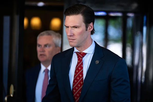 Reps. Pat Harrigan, R-N.C., and James Comer, R-Ky., left, leave the Capitol Hill Club after a meeting of the House Republican Conference on Tuesday, April 29, 2025.