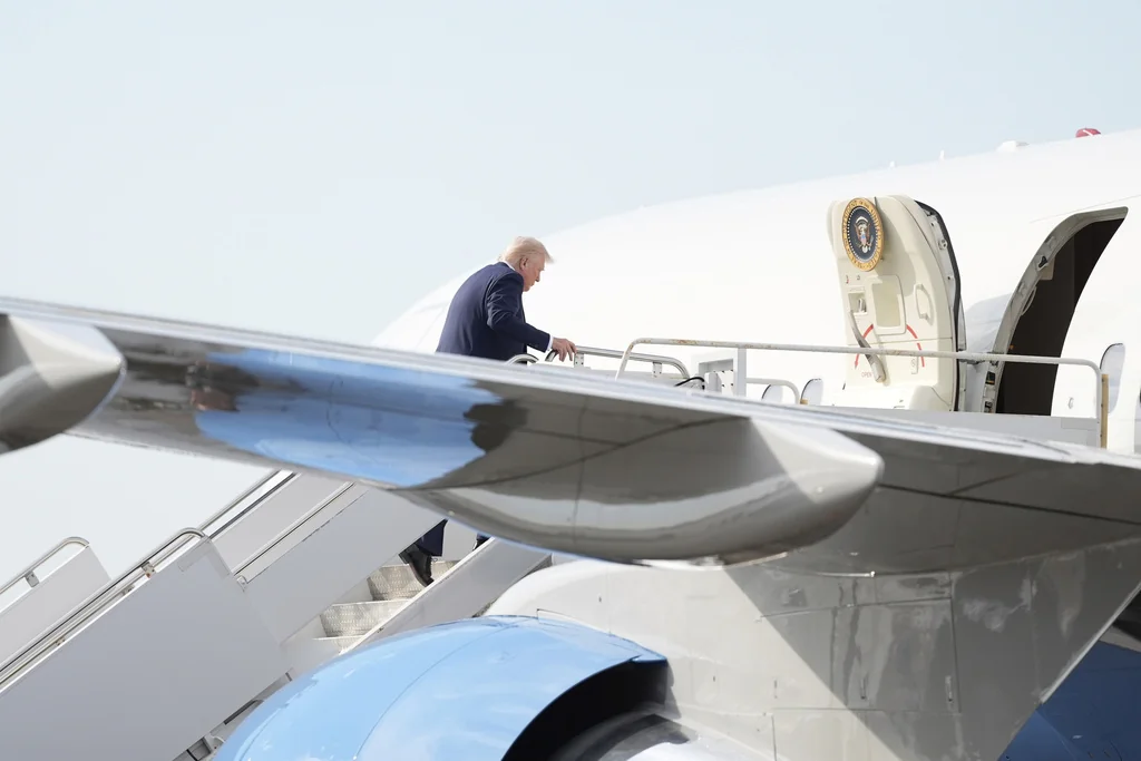 President Donald Trump boards Air Force One at Palm Beach International Airport, Sunday, May 4, 2025, in West Palm Beach, Fla.