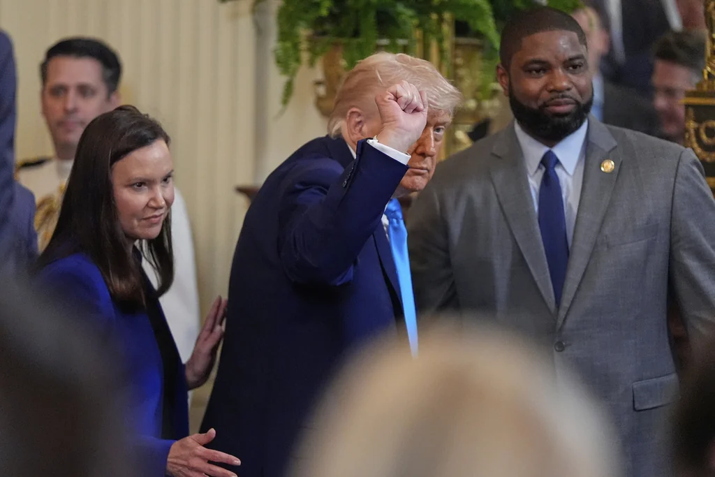 President Donald Trump departs with Sen. Ashley Moody, R-Fla., and Rep. Byron Donalds, R-Fla., after hosting the 2025 NCAA Champion, University of Florida men's basketball team in the East Room of the White House, Wednesday, May 21, 2025, in Washington.