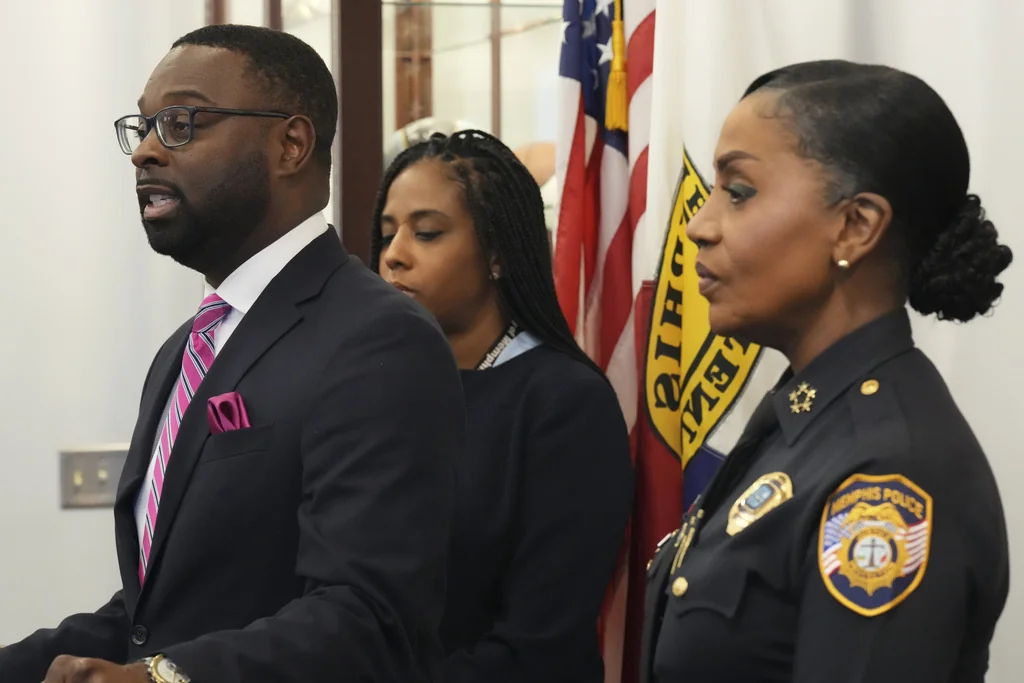 Mayor Paul Young, left, speaks during a news conference Thursday, Dec. 5, 2024, in Memphis, Tenn.