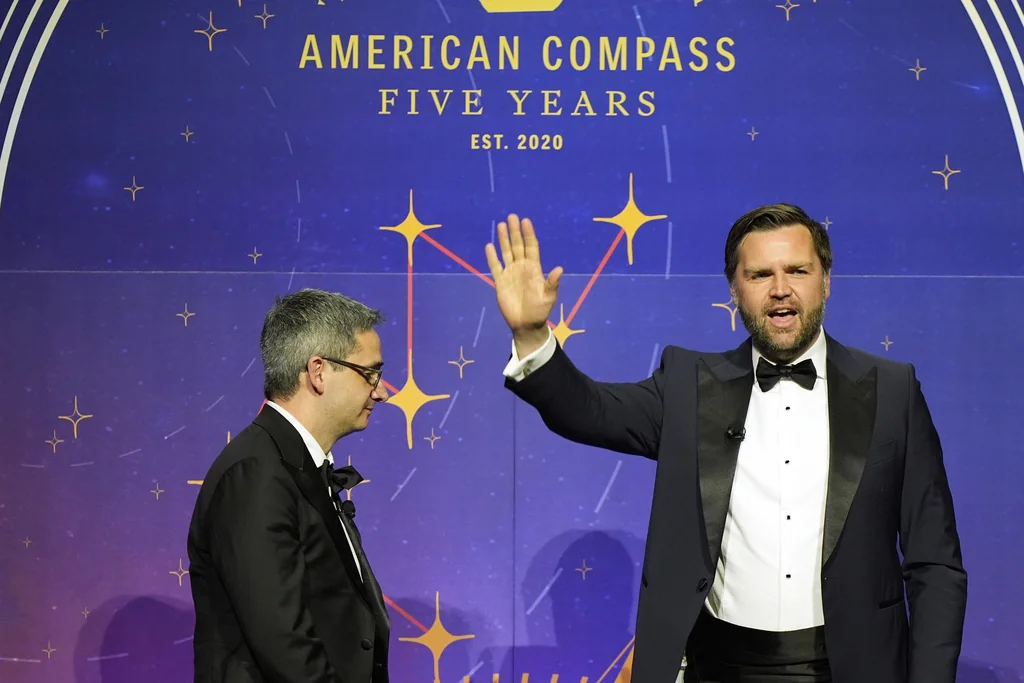 Vice President JD Vance waves after speaking with American Compass founder Oren Cass at the American Compass's The New World Gala in Washington, Tuesday, June 3, 2025. (AP Photo/Mark Schiefelbein)