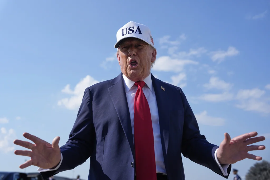 President Donald Trump talks to reporters before boarding Air Force One, Thursday, July 3, 2025, at Joint Base Andrews, Md.