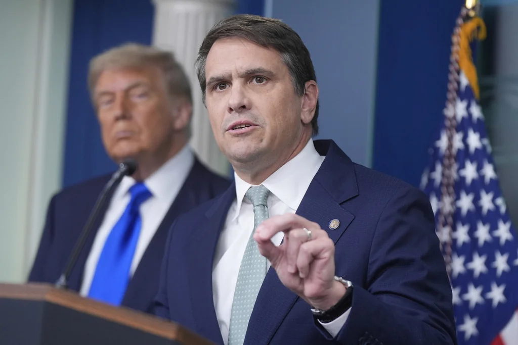 Deputy Attorney General Todd Blanche speaks to the media, Friday, June 27, 2025, in the briefing room of the White House in Washington, as President Donald Trump looks on.