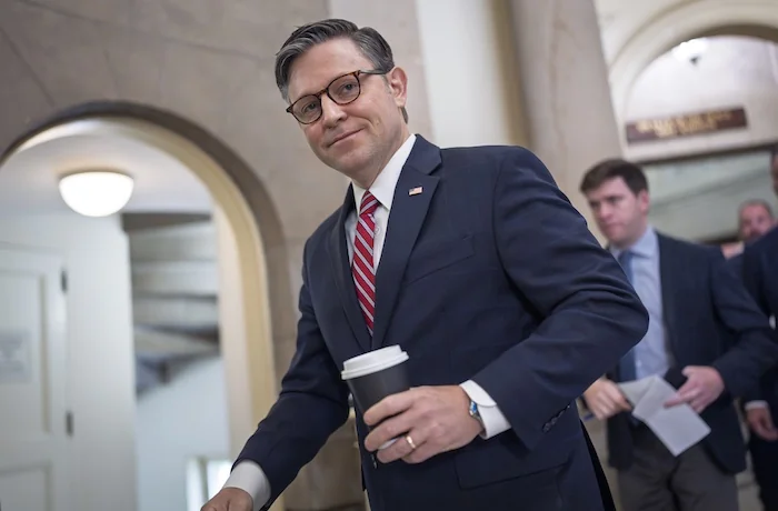 Speaker of the House Mike Johnson, R-La., heads to the chamber for the final votes of the week, as President Donald Trump's sweeping domestic policy bill lingers in the Senate, awaiting concensus from divided Republicans, at the Capitol in Washington, Friday, June 27, 2025