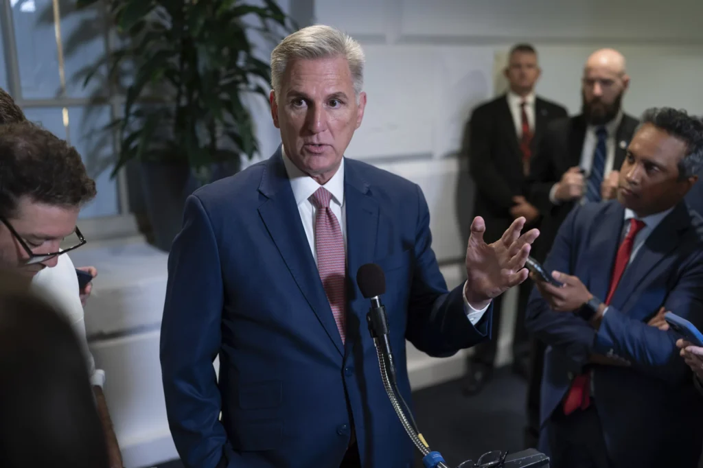 House Speaker Kevin McCarthy (R-CA) talks to reporters about avoiding a government shutdown and launching an impeachment inquiry into President Joe Biden, following a closed-door meeting with fellow Republicans at the Capitol in Washington, Thursday, Sept. 14, 2023. The most vulnerable House Republicans whose elections in swing districts next year will determine which party gains control of the chamber are overwhelmingly voicing their support for McCarthy's impeachment inquiry into Biden. Democrats say it's a stance that could come back to haunt them.