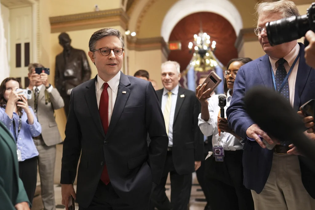 Speaker of the House Mike Johnson, R-La., with House Majority Leader Steve Scalise, R-La., speaks to reporters as he heads to the chamber, at the Capitol in Washington, Wednesday, July 2, 2025.