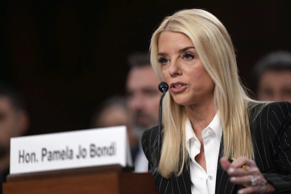 Pam Bondi, President-elect Donald Trump's choice to lead the Justice Department as attorney general, appears before the Senate Judiciary Committee for her confirmation hearing, at the Capitol in Washington, Wednesday, Jan. 15, 2025. 