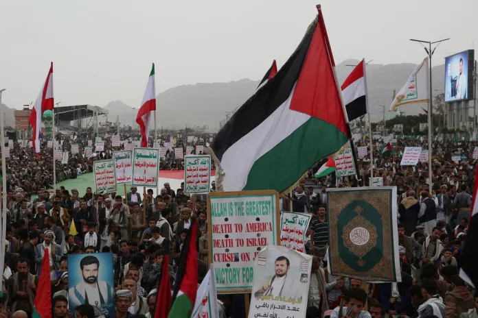 Houthi supporters shout slogans during an anti-U.S. and anti-Israel weekly rally in Sanaa, Yemen