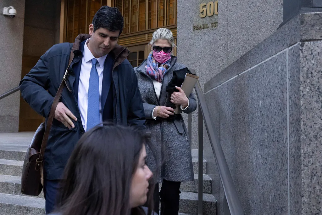 Nadine Menendez, back right, wife of former Sen. Bob Menendez, leaves Manhattan federal court, Tuesday, March 18, 2025, in New York.