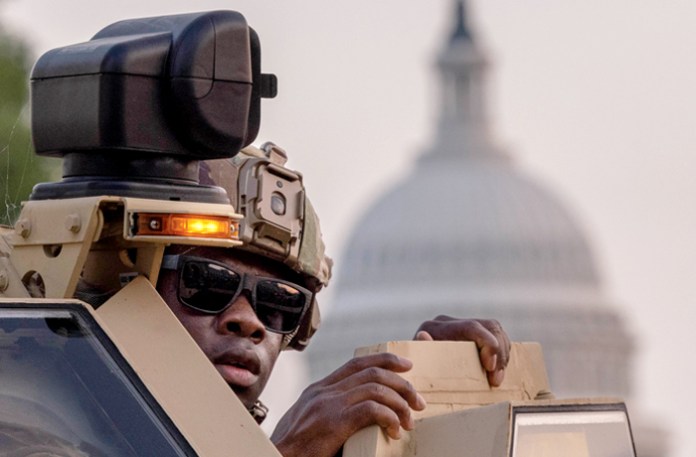 Members of the National Guard patrol the National Mall on Aug. 15. (Graeme Jennings/Washington Examiner)