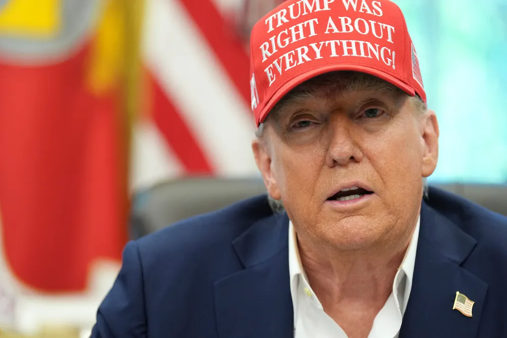 President Donald Trump speaks in the Oval Office of the White House, Friday, Aug. 22, 2025, in Washington.
