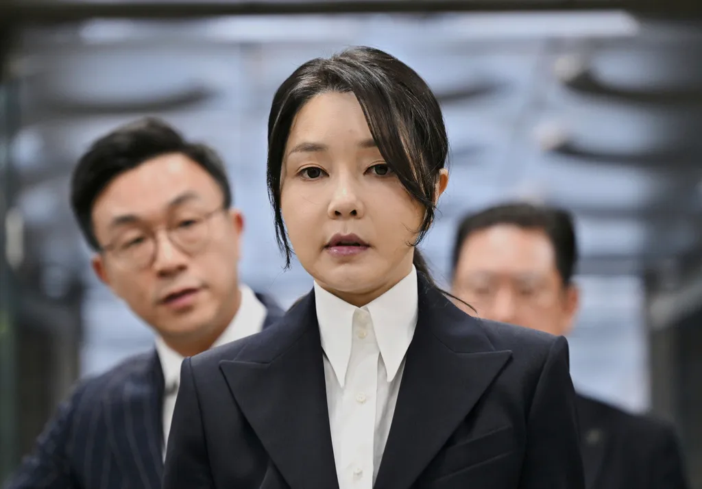 South Korea's former first lady Kim Keon Hee, wife of impeached former president Yoon Suk Yeol, arrives at a court to attend a hearing to review her arrest warrant requested by special prosecutors, in Seoul, South Korea, on Aug. 12, 2025.
