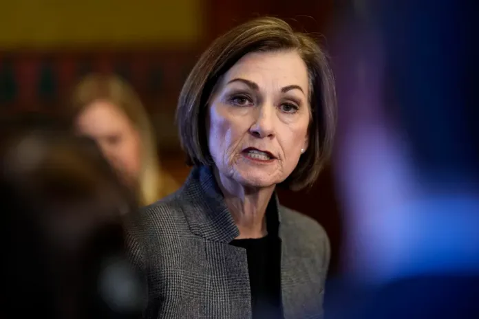 Iowa Gov. Kim Reynolds speaks during a news conference at the Statehouse in Des Moines, Iowa, Jan. 31, 2024.