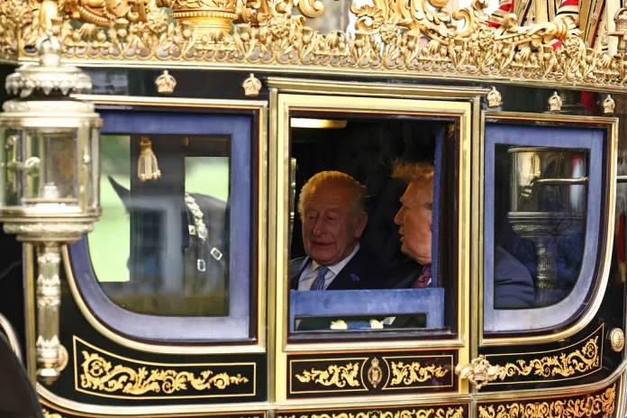 Trump and King Charles in royal carriage