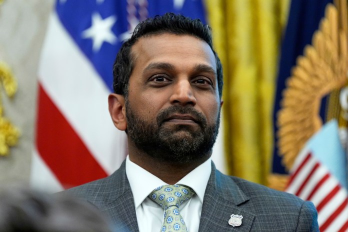 FBI Director Kash Patel listens as President Donald Trump speaks in the Oval Office.