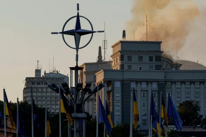 Smoke rises from the Cabinet of Ministers building after a Russian strike in Kyiv, Ukraine, on Sunday, Sept. 7, 2025. (AP Photo/Evgeniy Maloletka)