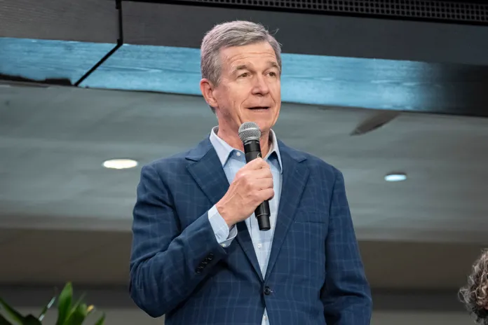 Roy Cooper speaks during a press conference for Concert for Carolina on Saturday, Oct. 26, 2024, in Charlotte, North Carolina.