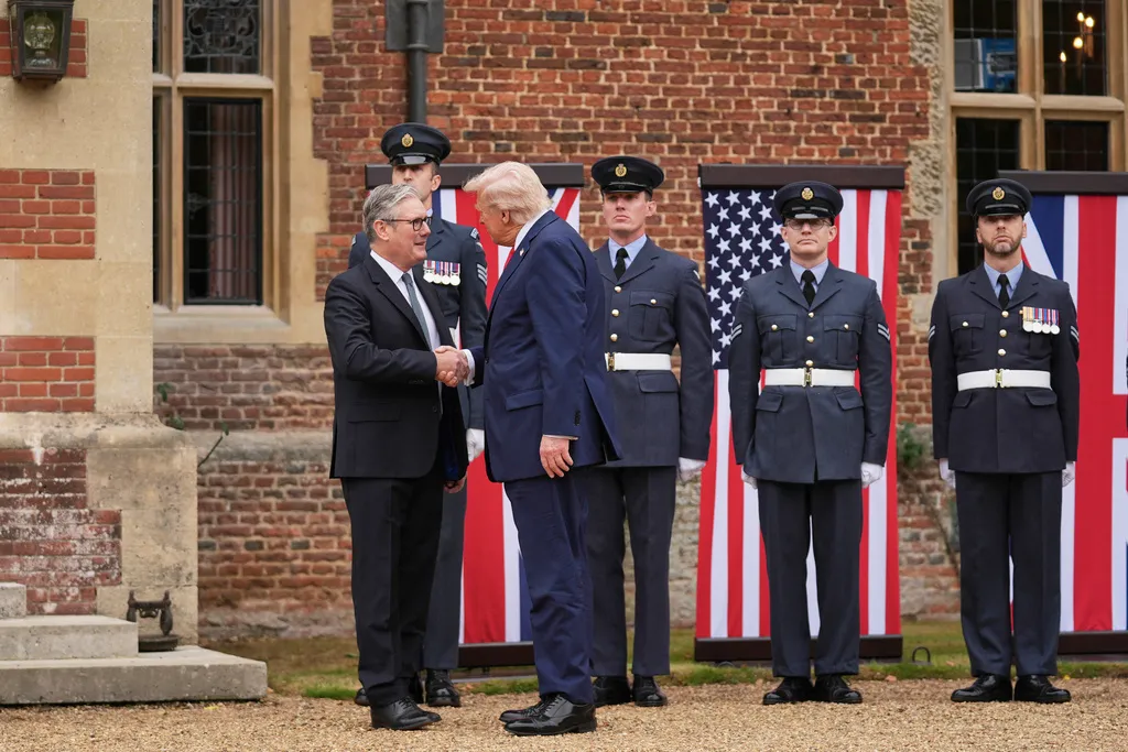 President Donald Trump shakes hands with Britain's Prime Minister Keir Starmer at Chequers near Aylesbury, England, Thursday, Sept. 18, 2025.