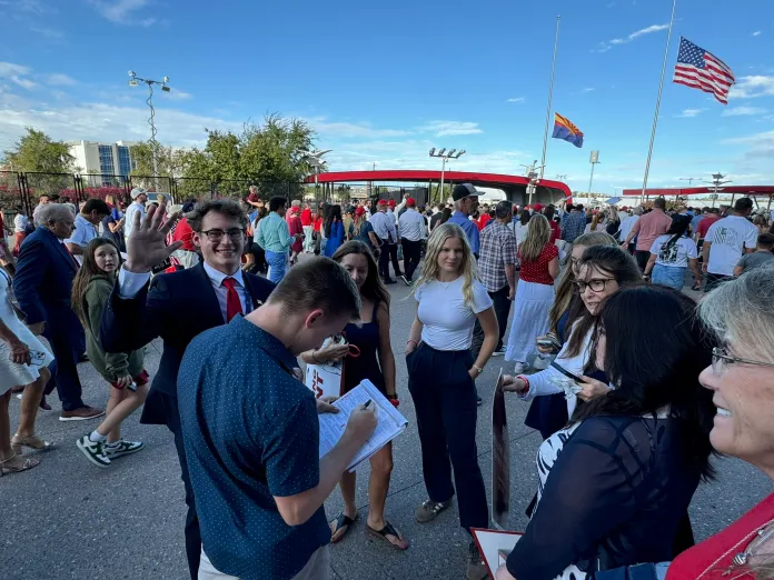 Volunteers sign up new voters at Charlie Kirk's memorial (Courtesy: Turning Point Action)