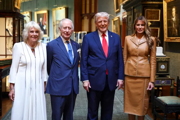 President Donald Trump and first lady Melania Trump, right, stand next to Britain's King Charles III and Queen Camilla as they bid their farewells during Donald Trump's departure from Windsor Castle, in Windsor, England, Thursday, Sept. 18, 2025. (Kevin Lamarque/Pool Photo via AP)