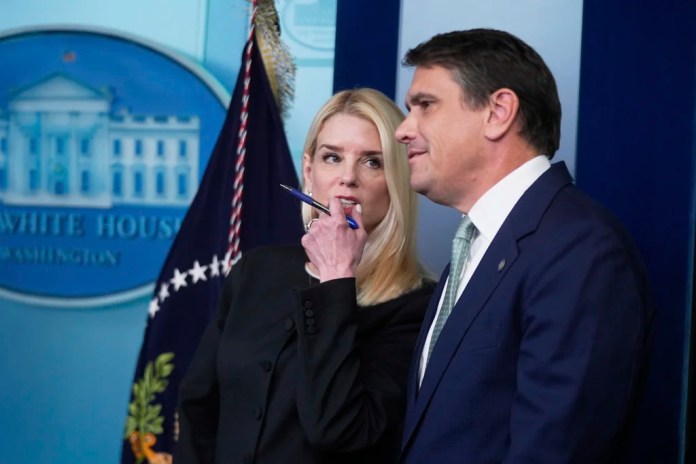 Attorney General Pam Bondi speaks to Deputy Attorney General Todd Blanche.