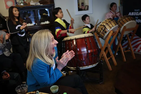 ANNANDALE, VIRGINIA - OCTOBER 30: Virginia Democratic gubernatorial candidate, former Rep. Abigail Spanberger reacts at the end of a Korean drumming ceremony performed by children during a campaign event at Soricha Tea & Theater on October 30, 2025 in Annandale, Virginia. Spanberger will face off against Republican candidate Winsome Earle-Sears in the Commonwealth of Virginia’s off-year election for governor and other statewide offices on November 4.