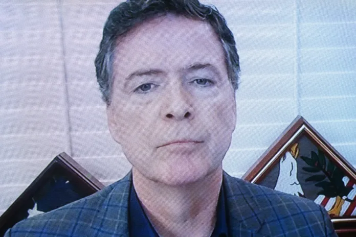 Former FBI Director James Comey testifies via videoconference during a Senate Judiciary Committee hearing.