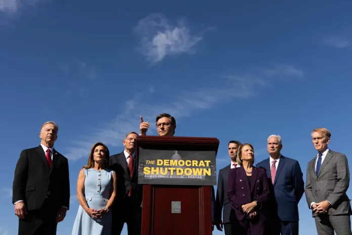 Speaker Mike Johnson (R-LA) answers questions from reporters at a press conference on the West Terrace of the U.S. Capitol on Oct. 1, 2025.