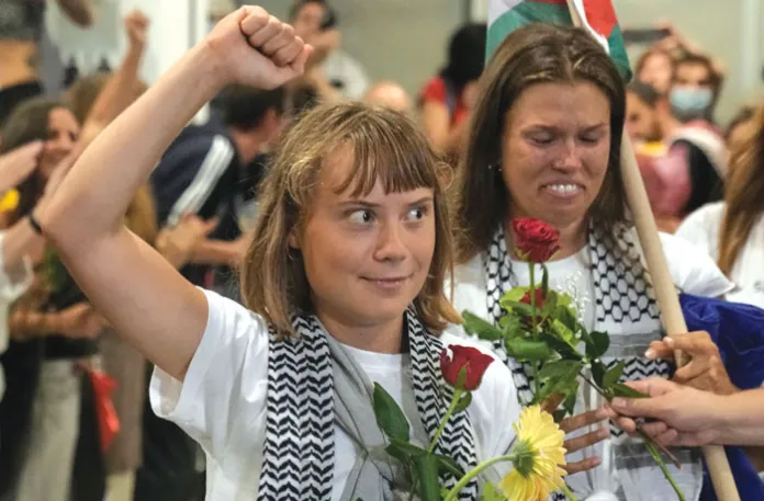 Thunberg arrives at the Eleftherios Venizelos International Airport in Athens, Oct. 6, 2025, after being deported from Israel. (Petros Giannakouris/AP)