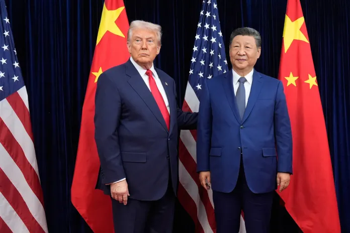 President Donald Trump and Chinese President Xi Jinping pose for a photo.