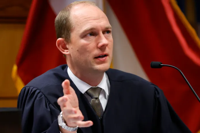 Fulton County Superior Judge Scott McAfee presides in court, March 1, 2024, in Atlanta. A Georgia appeals court has agreed to review a lower court ruling allowing Fani Willis to continue to prosecute the election interference case she brought against Donald Trump. (AP Photo/Alex Slitz, Pool)