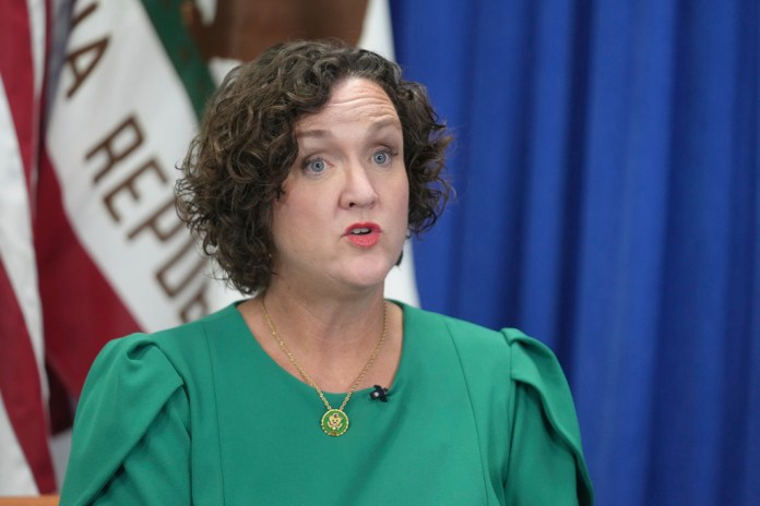 Former Rep. Katie Porter (D-CA) does an interview.