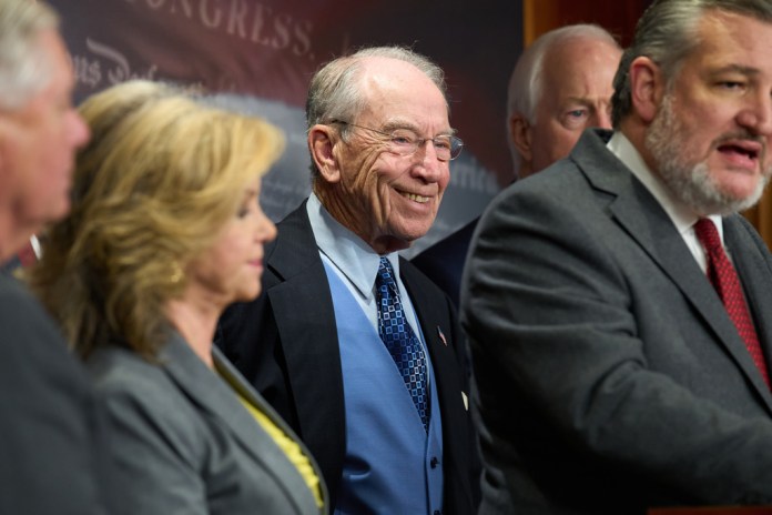 Sen. Chuck Grassley (R-IA) attends an event about "Arctic Frost" with Republican senators.