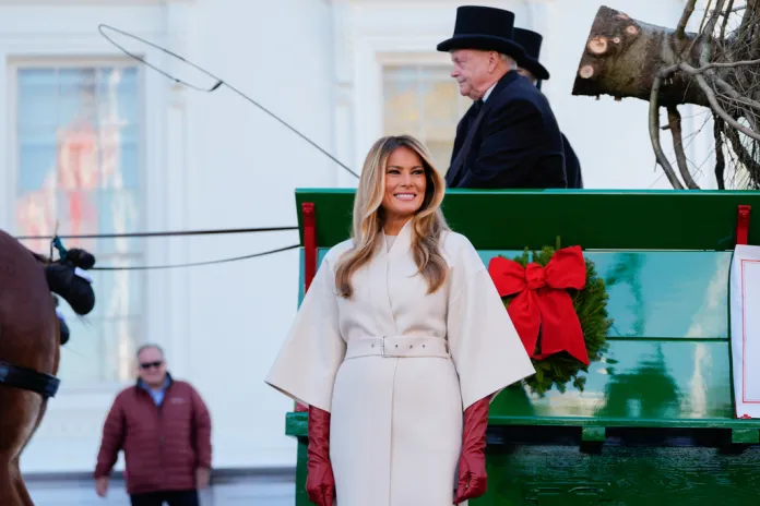 First lady Melania Trump receives the 2025 White House Christmas Tree.