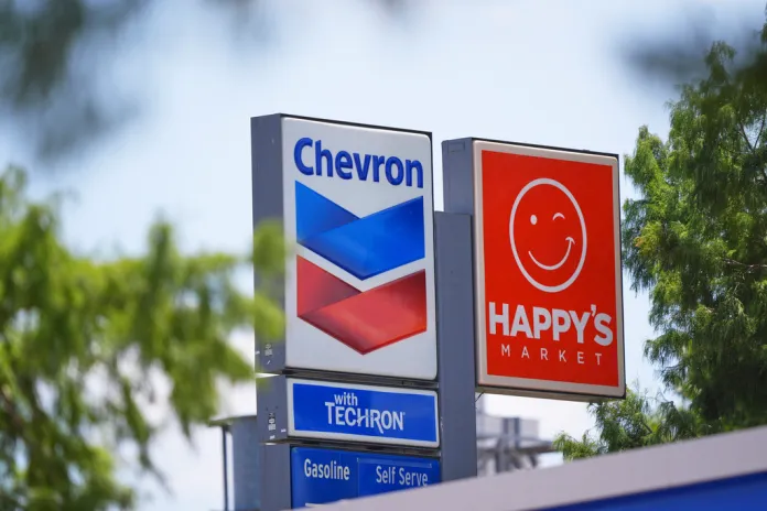 Chevron and Happy's Market signs