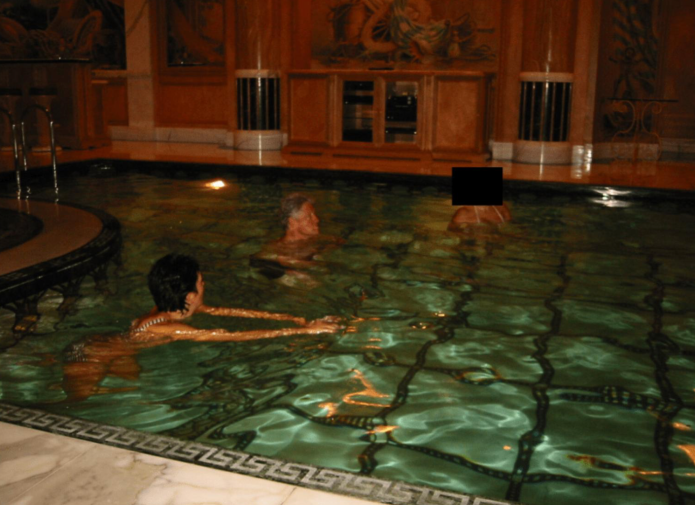 Bill Clinton swimming with Ghislaine Maxwell.