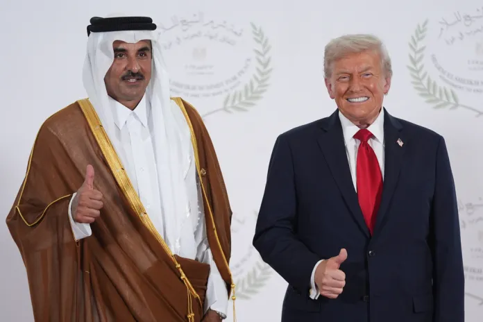 President Donald Trump greets Qatar Prime Minister and Foreign Minister Sheikh Mohammed bin Abdulrahman bin Jassim Al Thani during a summit to support ending the more than two-year Israel-Hamas war in Gaza after a breakthrough ceasefire deal, Monday, Oct. 13, 2025, in Sharm El Sheikh, Egypt. (AP Photo/Evan Vucci, Pool)